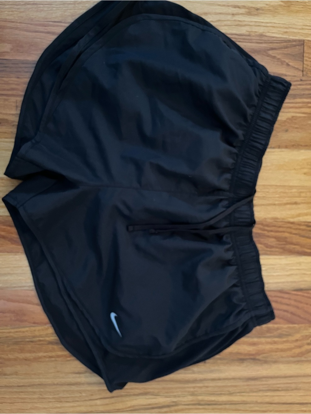 Nike woman’s Black Athletic Shorts with Reflective Swoosh